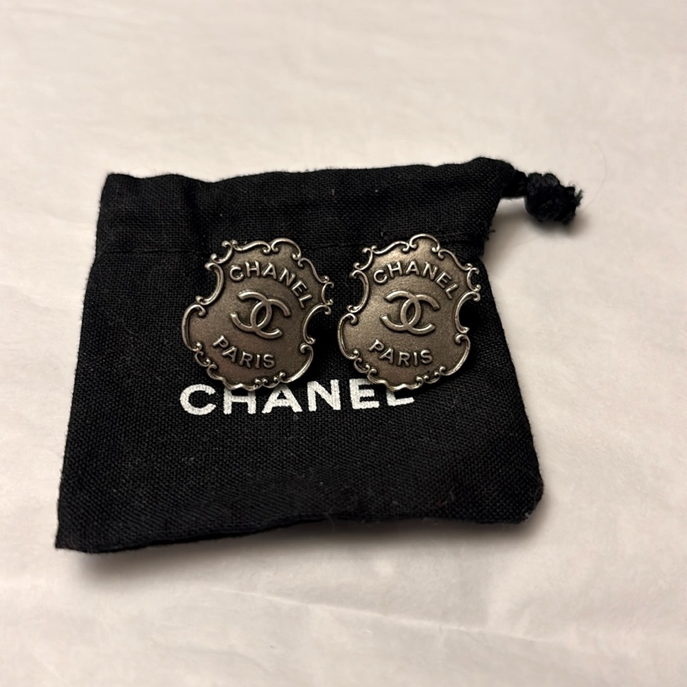 Authentic CHANEL Silver Camellia Earrings with Police Shield Dallas.
